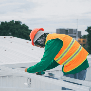 Over The Top Roofing installs quality pvc roofing panels on modern structures, ensuring durable, energy-efficient performance.