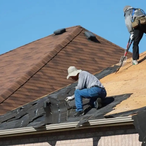 Experienced commercial roofing contractors at Over The Top Roofing expertly install durable roofs for business properties.